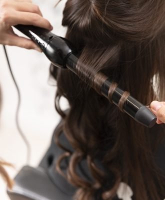 woman-getting-treatment-hairdresser-shop (1)